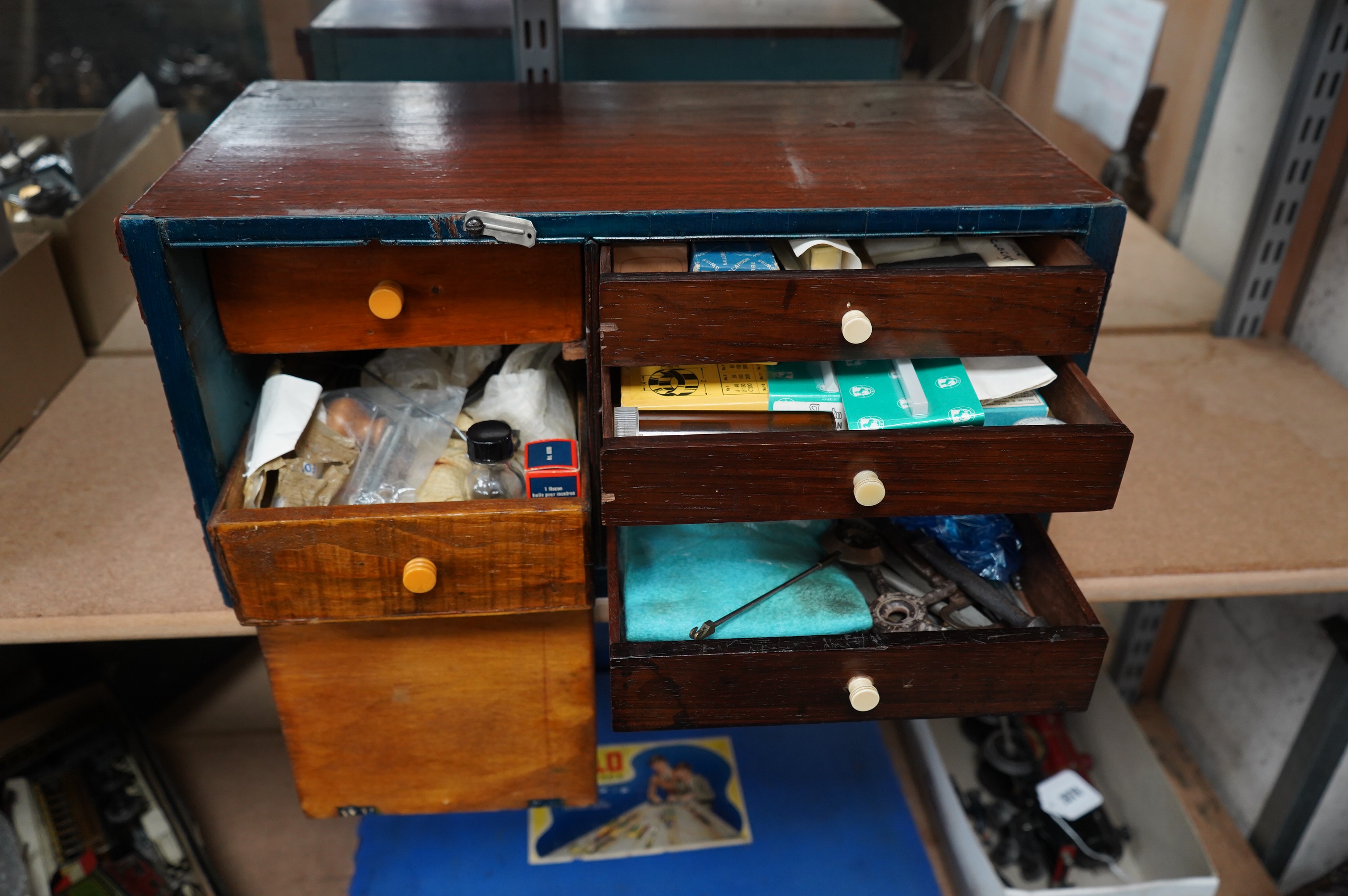 A quantity of clock parts, keys and tools of interest to a clock repairer. Condition - varies